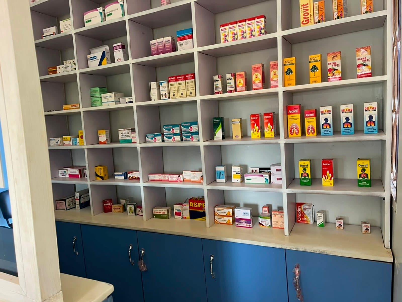 The medicine shelves in the dispensary at Shalom Clinic